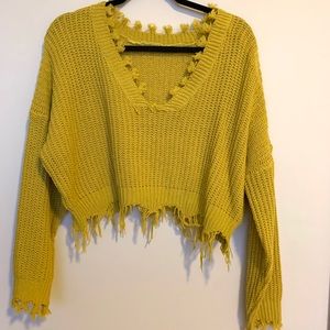 Distressed cropped sweater